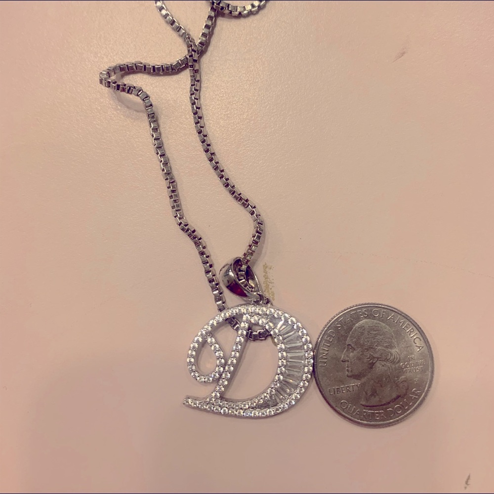 Crystal baggets sparkles alot  new not worn initial “d” with chain